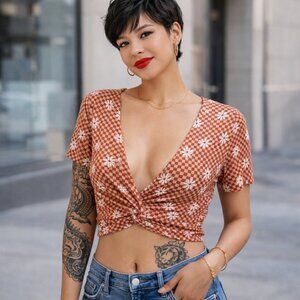 Large plaid crop top. Short sleeve tee plunging v-neck, twist front. Summer top